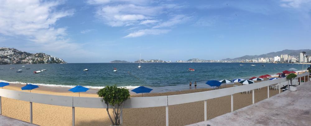 Panormaic view of the beach and bay from La Palapa Acapulco