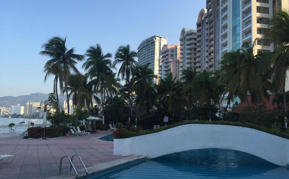 View of the condos in Costa Azul, Acapulco from the pool at La Palapa Hotel